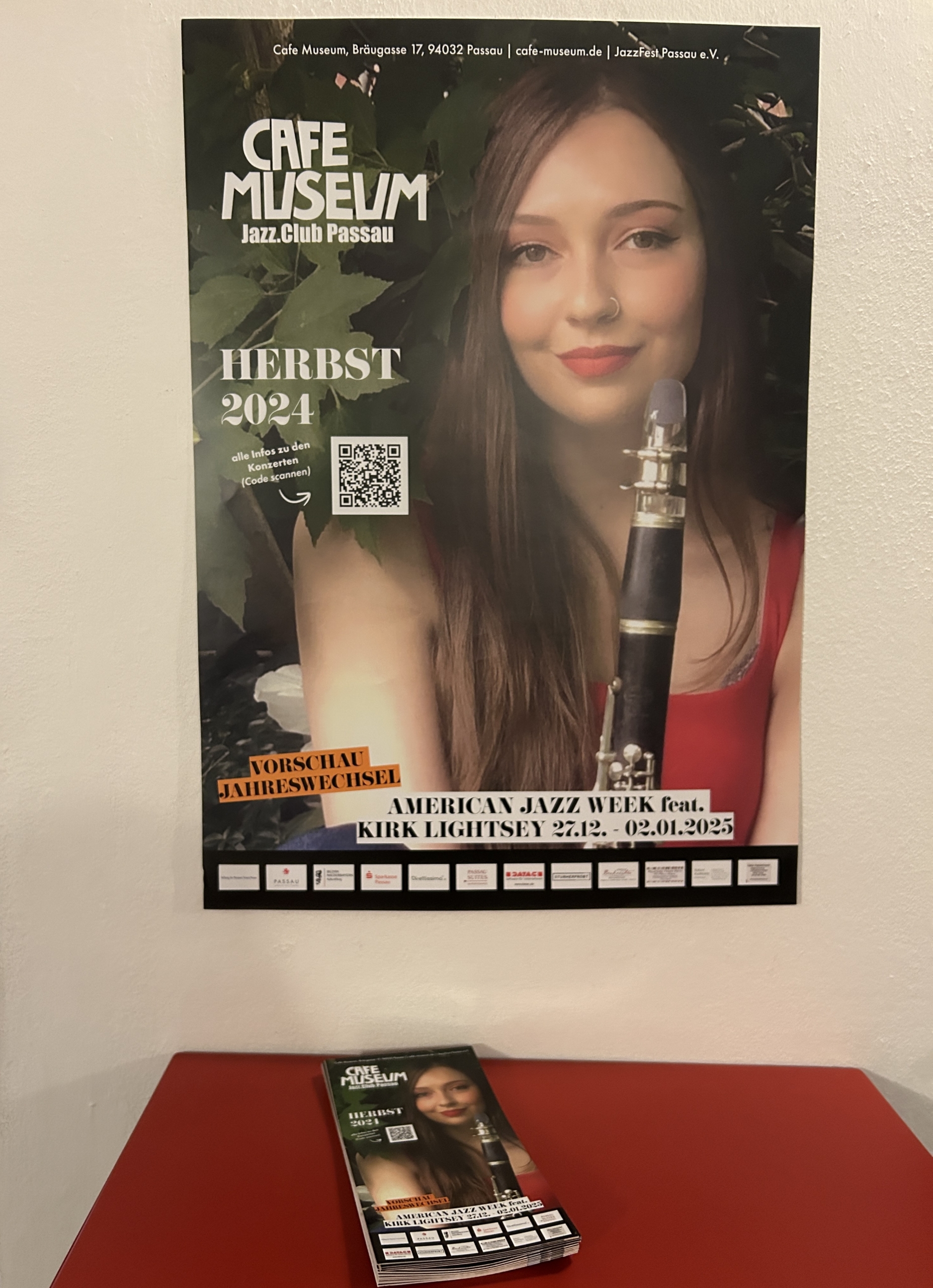 A poster featuring Virginia at Cafe Museum in Passau A poster featuring Virginia at Cafe Museum in Passau